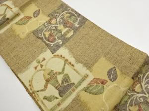 手織り紬色紙に古代人物・花瓶模様織出し名古屋帯